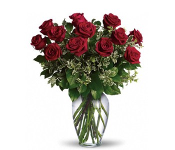 A dozen red roses in vase