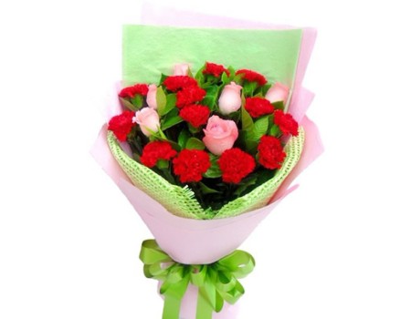 Carnations and pink roses